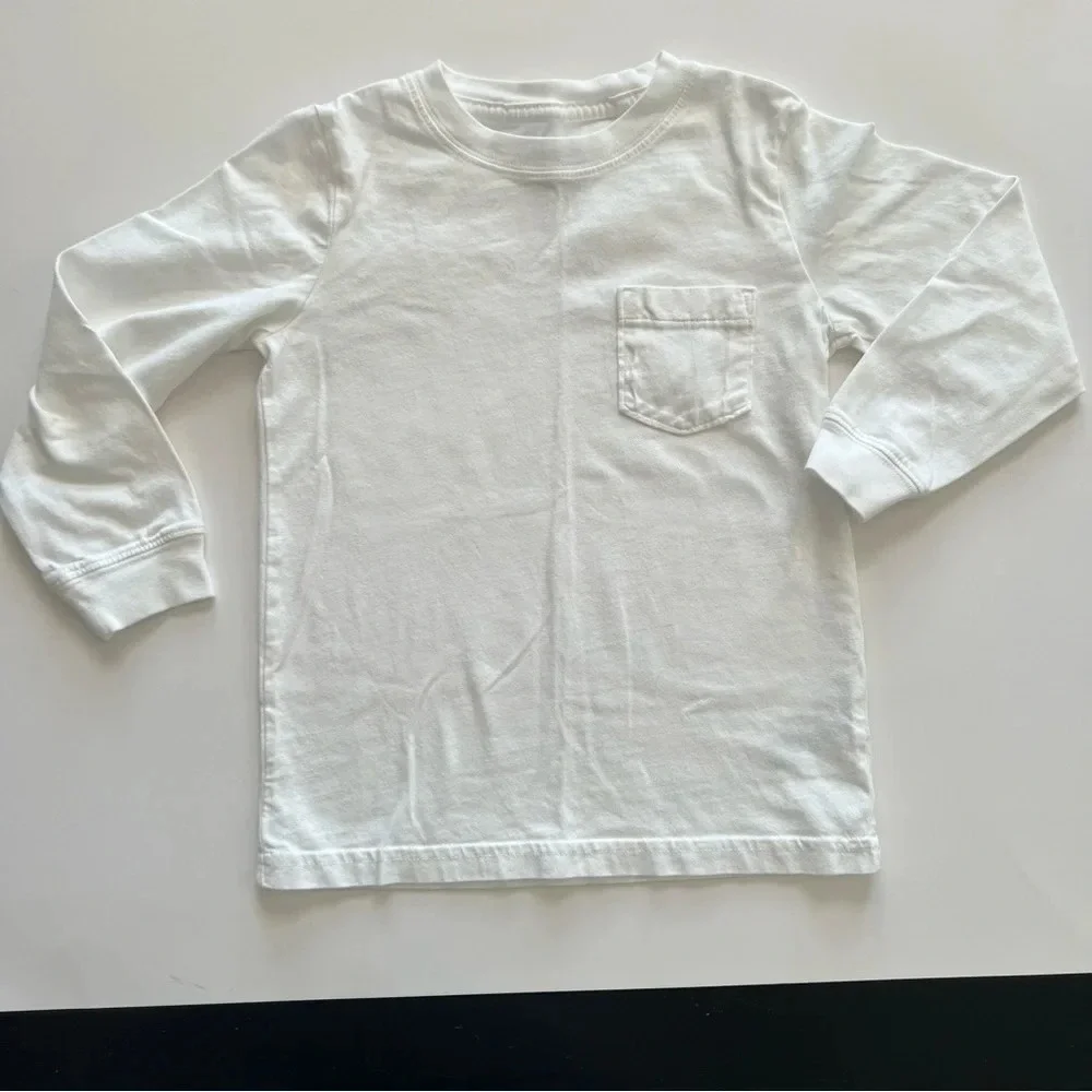 Boys pajama pants and white long sleeve shirt. 2 pair